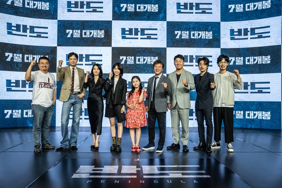 From left, director Yeon Sang-ho, actors Gang Dong-won, Lee Jung-hyun, Lee Re, Lee Ye-won, Kwon Hae-hyo, Kim Min-jae, Koo Kyo-hwan and Kim Do-yoon pose for camera at the online press event for the highly-anticipated zombie blockbuster "Peninsula." [NEXT ENTERTAINMENT WORLD] 