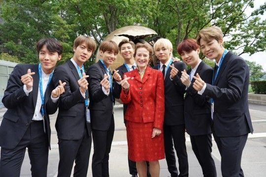 Global K-pop sensation BTS poses for a photo with Unicef Executive Director Henrietta Fore in 2018. [UNICEF]