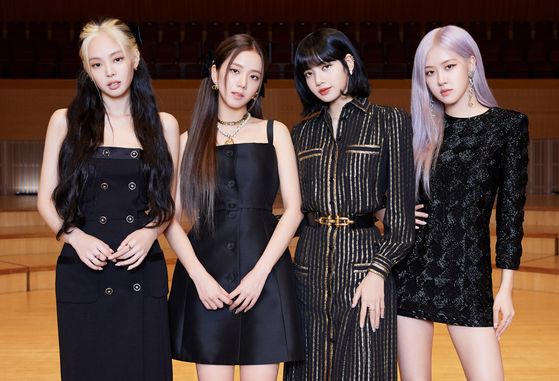 Blackpink stands for a photo after an online press conference held Friday afternoon through YouTube. [YG ENTERTAINMENT]