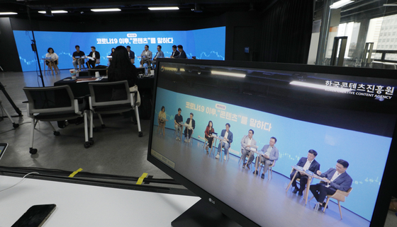 Experts sit for an online forum at the Gwanghwamun CKL Stage in central Seoul on July 21, on the subject of "Content after the Covid-19." [NEWS1]