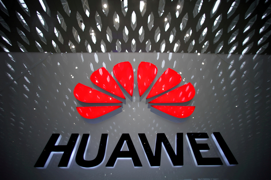 A Huawei company logo is pictured at the Shenzhen International Airport in Shenzhen, Guangdong Province, China on July 22, 2019. [REUTERS]