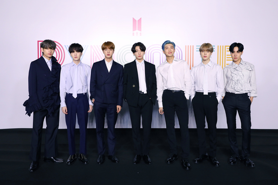 BTS poses for photos for the online press conference held on Friday morning prior to the release of its new digital single "Dynamite." [BIG HIT ENTERTAINMENT]