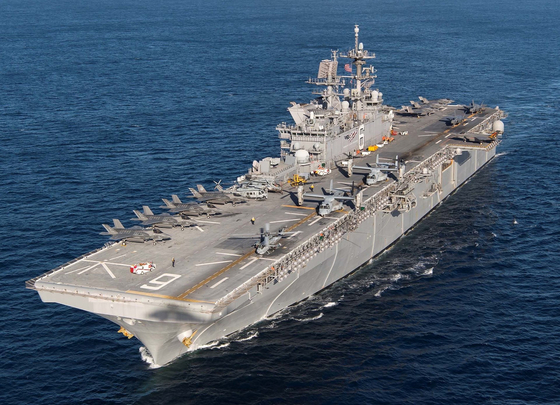 A U.S. Navy America-class aircraft carrier, capable of vertical landing and take off operations. Korea plans to build its own light carrier with a similar displacement by the early 2030s. [U.S. Navy]