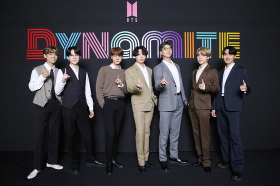 BTS poses for photos prior to the online press conference held on Wednesday morning to share its thoughts on having reached No. 1 on Billboard's Hot 100 singles chart for the first time. [BIG HIT ENTERTAINMENT]