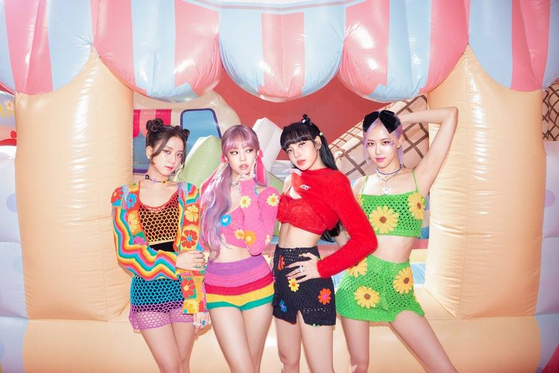 Blackpink dressed in hippie-style crochet clothing. [YG ENTERTAINMENT]