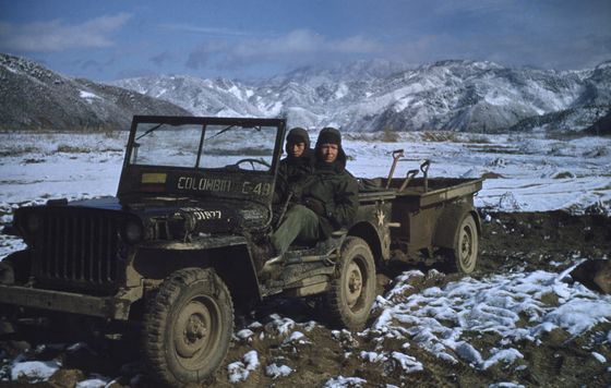 Diaz, right, on a Willys M38, next to a Mexican interpreter. The jeep was a utility vehicle used in the Korean War for attack, command and control missions and for emergency transportation of personnel wounded in combat. [GILBERTO DIAZ VELASCO] 