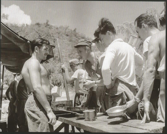 Members of the French Battalion receiving their rations near the site of the Battle of T-Bone in 1952. The photo has been provided by Ecpad to the French Embassy in Seoul. [ECPAD/GABRIEL APPAY]