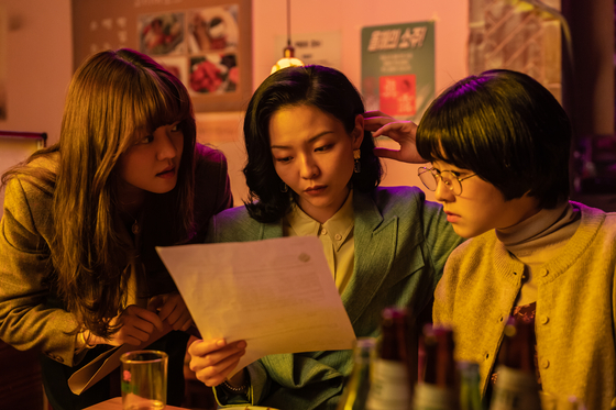 From left, actors Go Ah-sung, Esom and Park Hae-soo as Ja-young, Yu-na and Bo-ram on a mission to resolve the massive corruption scandal of their company Samjin. [LOTTE ENTERTAINMENT] 