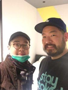 Kim Han-sol, left, the son of Kim Jong-nam, poses with Free Joseon member Christopher Ahn in a selfie taken days after he left Macau in 2017. Kim Jong-nam is the older half brother to North Korea's leader Kim Jong-un, and was killed with nerve poison in Malaysia. [FREE JOSEON]