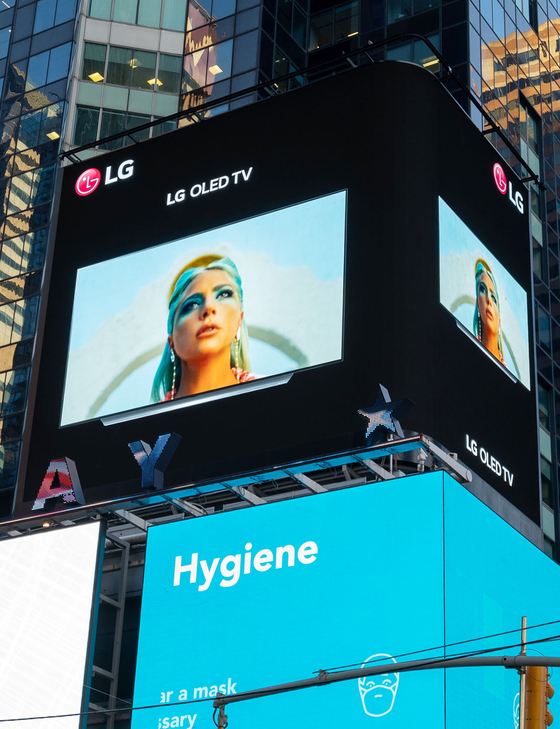 The music video for Lady Gaga’s “911” is played on an LG Electronics light-emitting diode (LED) display board in Times Square, New York. According to LG, the video has been playing since Nov. 6. The singer also collaborated with LG to release an exclusive version of the “911” music video only available on LG OLED TVs. [LG ELECTRONICS]