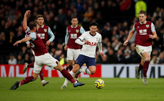 Tottenham Hotspur's Son Heung-min dribbles his way through Burnley's defense on Dec. 7, 2019. [REUTERS/YONHAP]
