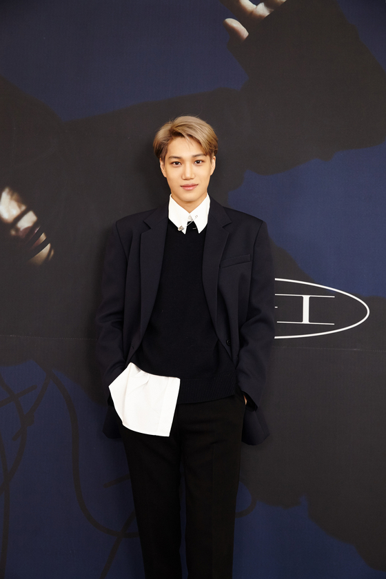 Singer Kai poses for photos prior to the press conference held on Monday morning for his first solo album ″KAI.″ [SM ENTERTAINMENT]