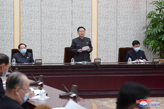 Choe Ryong-hae, president of North Korea's Supreme People's Assembly Presidium, center, presides over a plenary meeting of the rubber stamp legislature in Pyongyang on Friday, as shown in a photograph released by state media. [YONHAP]