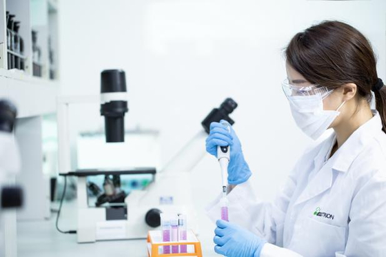 A Celltrion researcher conducts tests at the company’s headquarters in Incheon. [CELLTRION]