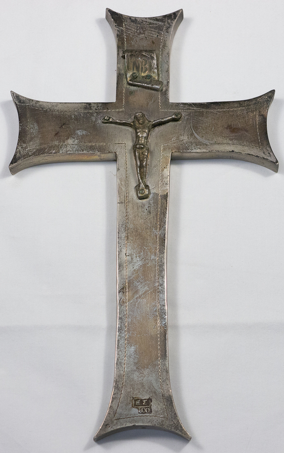 Cross that the Greek orthodox priests had carried from Greece to Korea during the Korean War to use during their services with the soldiers. It has been gifted to the Korean orthodox church by the priests when they departed the nation following the conclusion of the war. [ORTHODOX METROPOLIS OF KOREA]