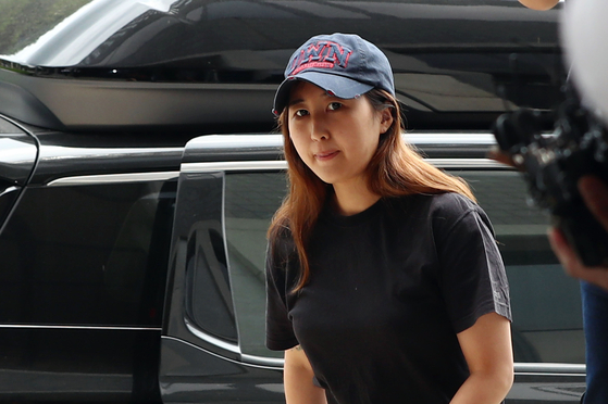 In this file photo, Chung Yoo-ra, the daughter of Choi Soon-sil, enters the Seoul Central District Prosecutors' Office on July 3, 2017.  [YONHAP] 