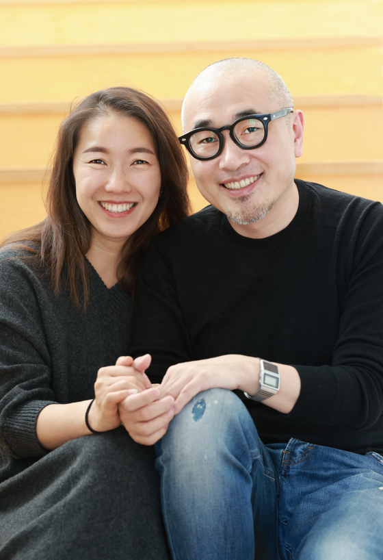Kim Bong-jin, right, founder and CEO of Woowa Brothers and his wife Sul Bo-mi. [WOOWA BROTHERS]