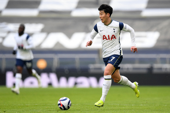Tottenham Hotspur's striker Son Heung-Min runs with the ball during the English Premier League football match between Tottenham Hotspur and Burnley at Tottenham Hotspur Stadium in London, on Feb. 28. [YONHAP/AFP]