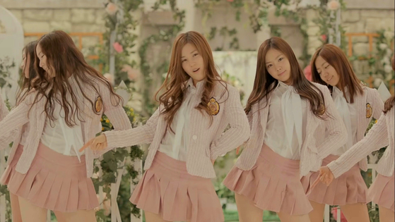 A scene from girl group Apink's music video for its debut song ″I Don't Know″ (2011). When Apink debuted, it emphasized a girly, innocent image. [SCREEN CAPTURE]