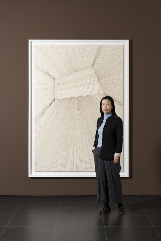 Artist Minjung Kim poses with her work. [GALLERY HYUNDAI]