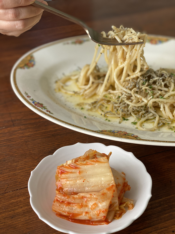 Kimchi is served with pasta at Salt. [HONG SHIN-AE]