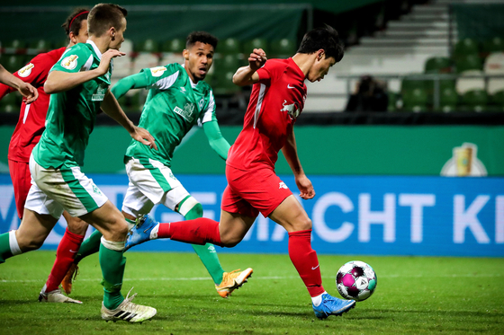 Leipzig's Hwang Hee-chan scores the opening goal during the German DFB Cup semifinal between Werder Bremen and RB Leipzig in Bremen, Germany on Friday. [EPA/YONHAP]
