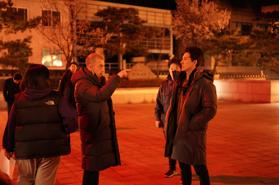 Martin directing on the set of “Dramaworld 2.” [LIFETIME]