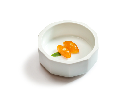 Geumgyul jeonggwa, or kumquat preserved in honey, is one of the items served as part of the spring dessert set. [KOREA HOUSE]