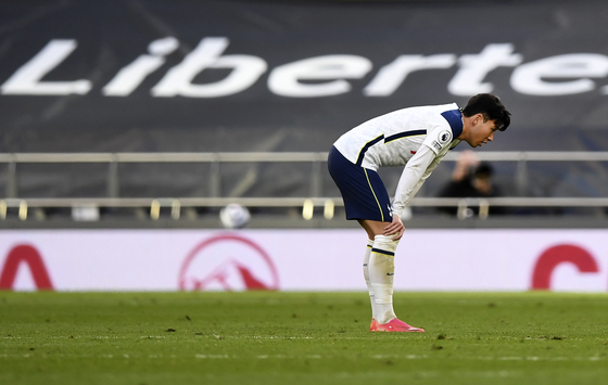 Son Heung-min reacts after the Premier League match between Tottenham Hotspur and Aston Villa in London on Wednesday. [AFP/YONHAP]