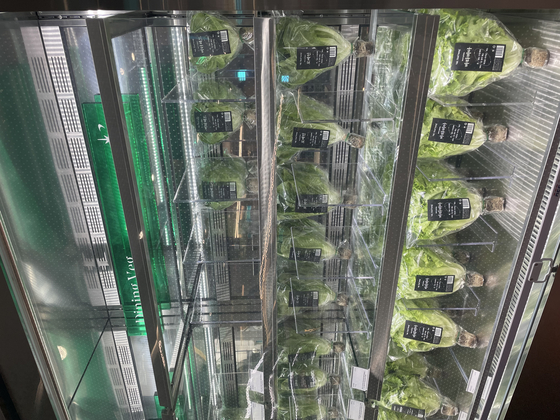 Vetegables grown in such vertical farms are sold at Sikmulsung Dosan. [LEE SUN-MIN]