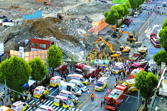 An aerial view of the site of the building collapse in Hak-dong, Dong District of Gwangju on June 9. [JEONG JEONG-PIL]