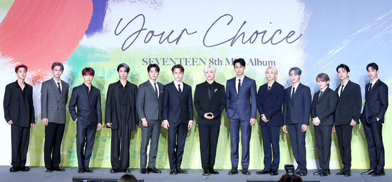 The boy band Seventeen at an online press conference for the mini-album ″Your Choice″ on Friday. [PARK SE-WAN]