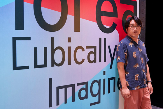 Bryan Ku, the head director of EVR Studio and the director behind the VR content inspired by “Parasite” (2019), poses for a photo at the press preview of his content currently on display at Unesco’s headquarters in Paris. [KOCCA]
