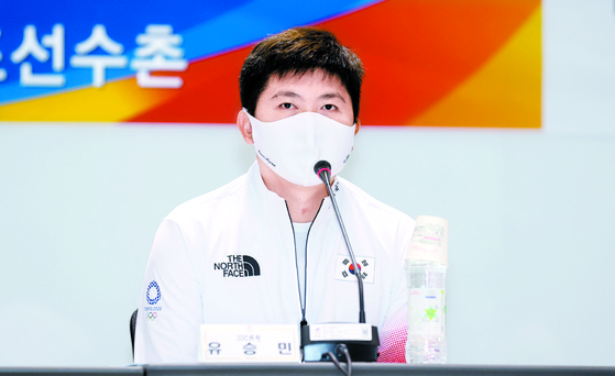 Ryu Seung-min, International Olympic Committee member and president of the Korea Table Tennis Association, answers questions at the 2020 Tokyo Media Day event at Jincheon National Training Center in Jincheon, North Chungcheong on June 28. [YONHAP]
