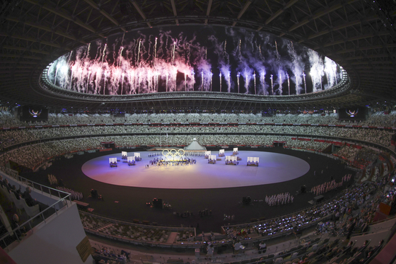 The 2020 Tokyo Olympics opening ceremony took place on Friday evening in a largely empty Tokyo Olympic Stadium. [YONHAP]