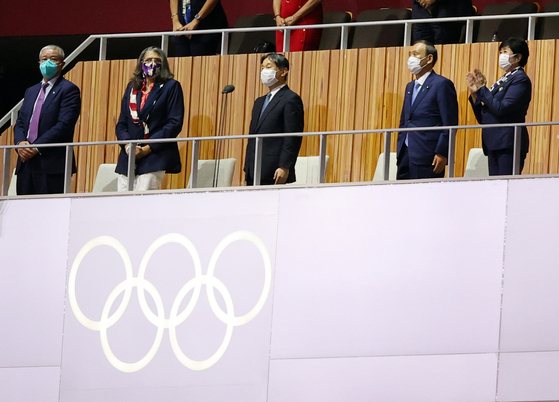 Japanese Emperor Naruhito, center, speaks at the opening ceremony of the Summer Games at the Olympic stadium in Shinjuku, Tokyo, Friday. [NEWS1]