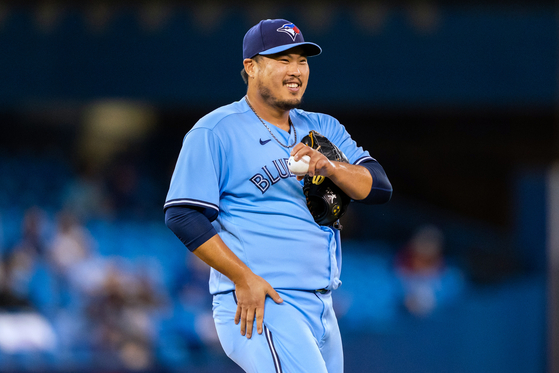 Toronto Blue Jays starting pitcher Ryu Hyun-jin smiles during a game against the Cleveland Indians at the Rogers Centre in Toronto on Tuesday. [USA TODAY/YONHAP]