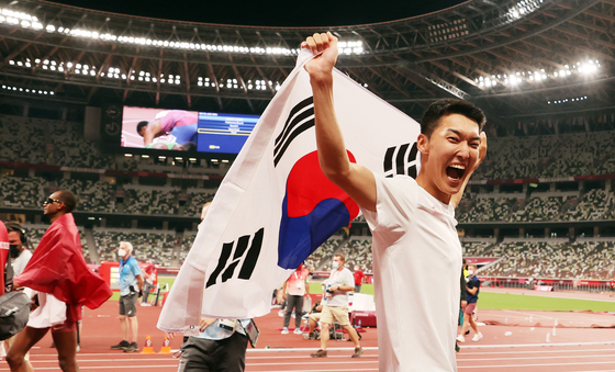  Twenty-five-year-old Woo Sang-hyeok, who cleared the bar at 2.35 meters in the men's high jump final, setting a new Korean record. [YONHAP]