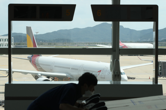 An Asiana Airlines aircraft parked at Incheon International Airport on July 14 [YONHAP]