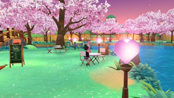 A user looks at cherry blossoms at a virtual park produced within Naver Z's metaverse app Zepeto [SCREEN CAPTURE]
