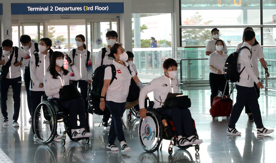 The Korean Paralympic team arrives at Incheon International Airport in Incheon on Wednesday morning to depart for the Tokyo Paralympics that will take place from Tuesday to Sep. 5. [NEWS1]