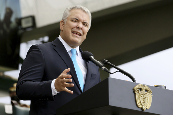 Colombian President Ivan Duque speaks during a military parade celebrating the country's 211 years of independence from Spain, at the General Jose Maria Cordoba Military School for Cadets in Bogota, Colombia, on July 20. [AP/LEONARDO MUNOZ/YONHAP]