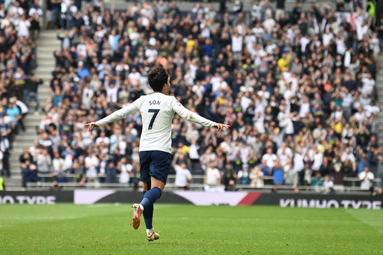 Tottenham Hotspur's Son Heung-min celebrates after scoring the opening goal during a match against Watford at Tottenham Hotspur Stadium in London on Sunday. [AFP/YONHAP]