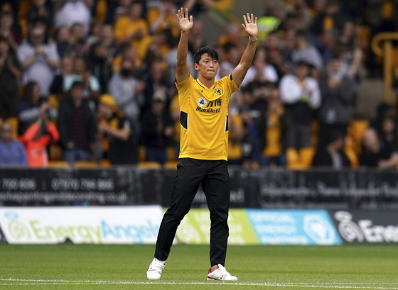 Wolverhampton Wanderers new signing Hwang Hee-chan is unveiled to the crowd prior to the kick-off of a game between Wolves and Manchester United at Molineux Stadium in Wolverhampton, England on Sunday. [AP/YONHAP]