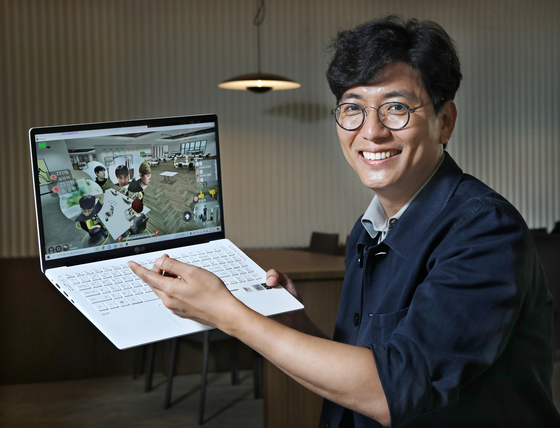 Ahn Sung-woo, founder and CEO of Zigbang, poses for a photo while logged into the company's Metapolis metaverse, which supports remote working. [PARK SANG-MOON]