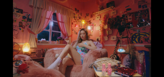 A scene from singer Sunmi's music video for "You can't sit with us" (2021) [SCREEN CAPTURE]