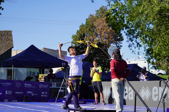 Kim Woo-jin celebrates winning the individual men's recurve gold medal, his third gold medal at the 2021 World Archery Championships in Yankton, South Dakota on Sunday. [WORLD ARCHERY FEDERATION/YONHAP]