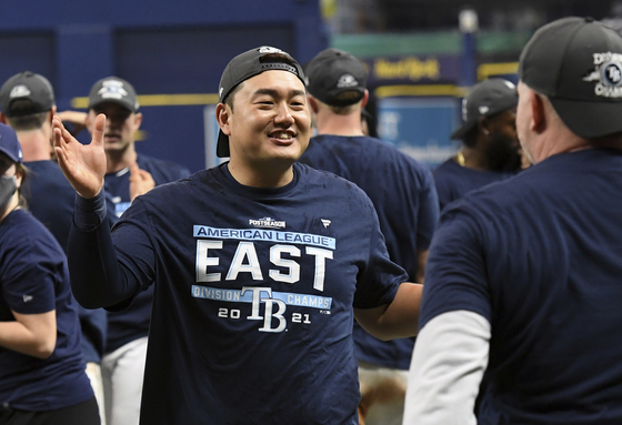Tampa Bay Rays' Choi Ji-man celebrates after beating the Miami Marlins 7-3 to clinch the American League East during a game on Sept. 25 in St. Petersburg, Florida. [AP/YONHAP]