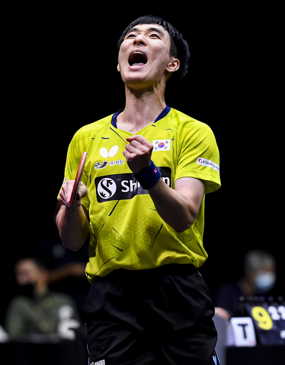 Lee Sang-su celebrates after the men's singles final against Chuang Chih-Yuan of Chinese Taipei at the 2021 ITTF-ATTU Asian Championships Doha in Doha, Qatar on Tuesday. [XINHUA/YONHAP]