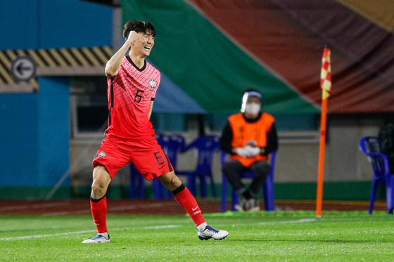 Hwang In-beom celebrates scoring Korea's first goal in the third round of qualifiers for the 2022 Qatar World Cup at Ansan Wa Stadium in Ansan, Gyeonggi on Thursday. [NEWS1]